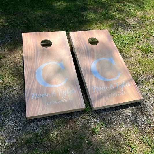 custom cornhole boards outside