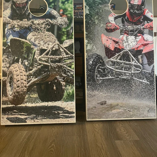 Off-road cornhole set with ATV riders