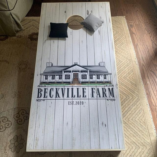 Beckville Farm custom white wood plank cornhole board with black and grey bean bags.