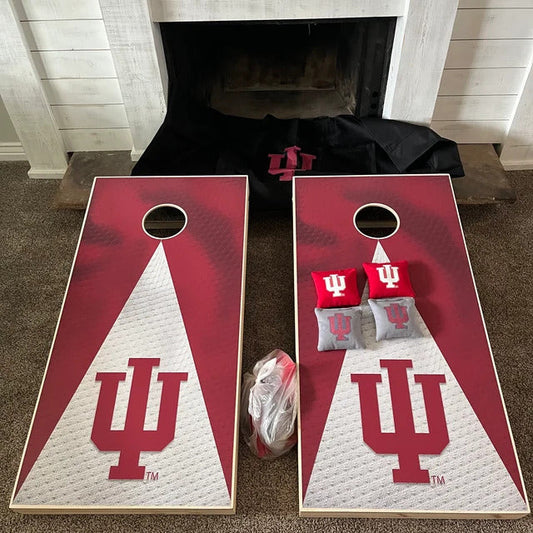 Indiana Hoosiers themed cornhole game in front of a fireplace