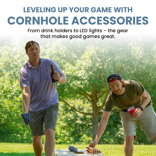 Two men playing cornhole outdoors with a beer bottle and bean bags