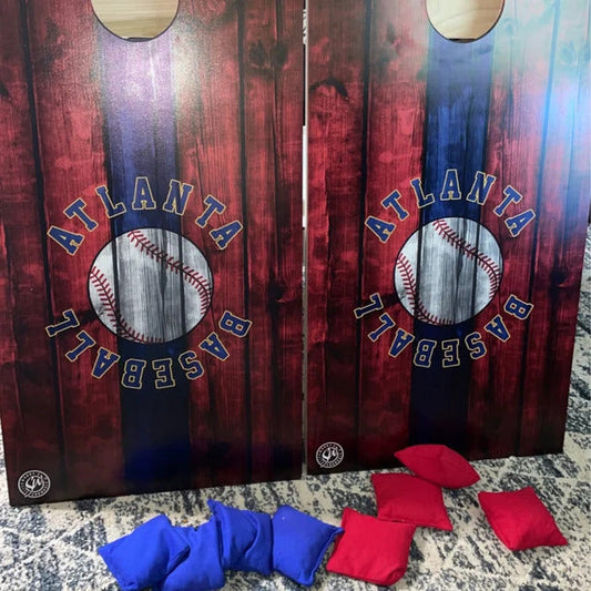 Atlanta Baseball themed cornhole boards with red and blue bean bags.