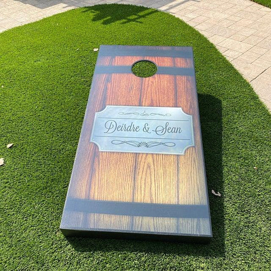 playing cornhole outside in the summer