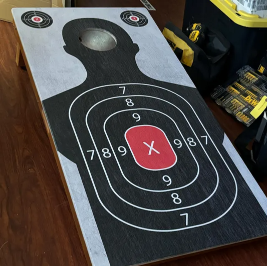 Target practice cornhole board