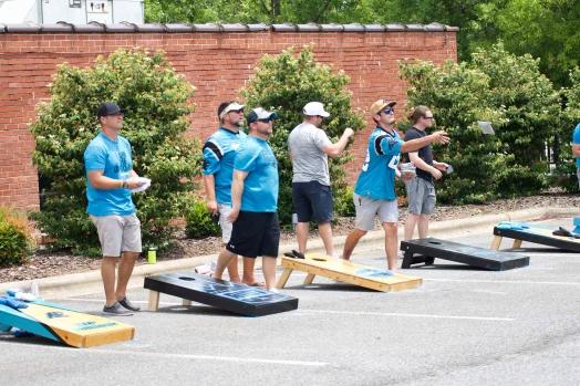 cornhole team in action