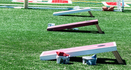 photo of a cornhole tournament setup