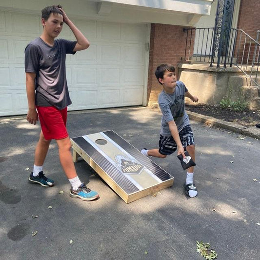 learning cornhole trick shots