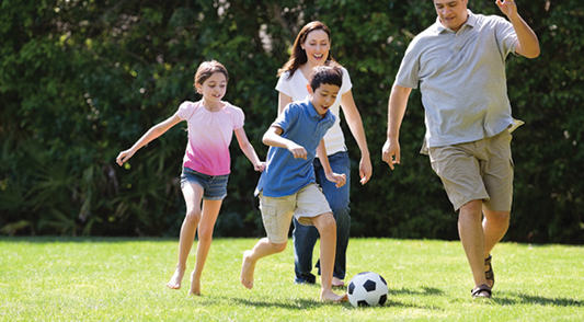playing soccer with the family