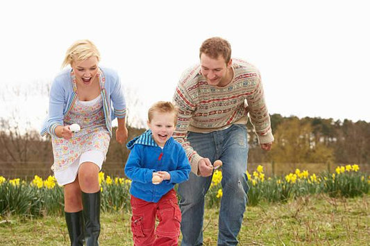 parents playing with kid on road trip
