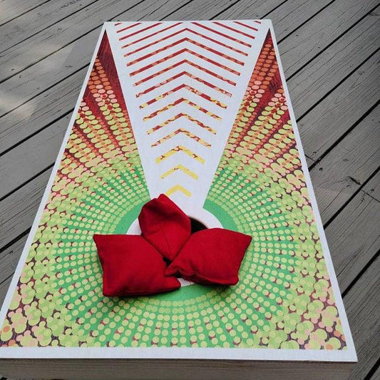 Cornhole board with a white chevron pattern