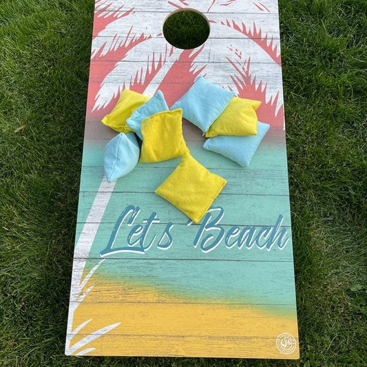 photo of cornhole boards and bags