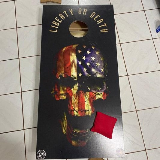 Skull and flag cornhole board