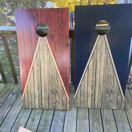 Red and blue wood-grain cornhole boards