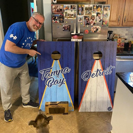 showing off sports team cornhole set