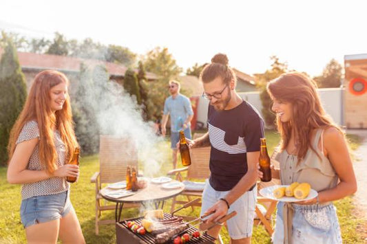friends outside barbecuing