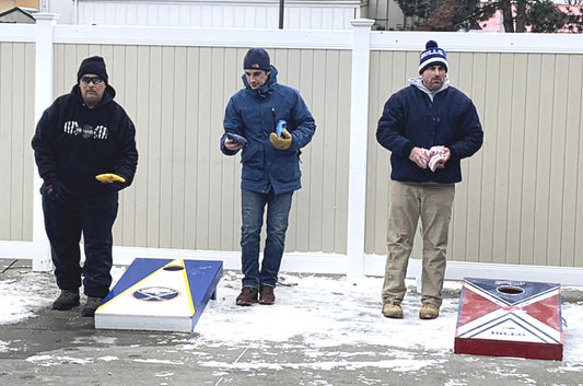 playing cornhole in the snow
